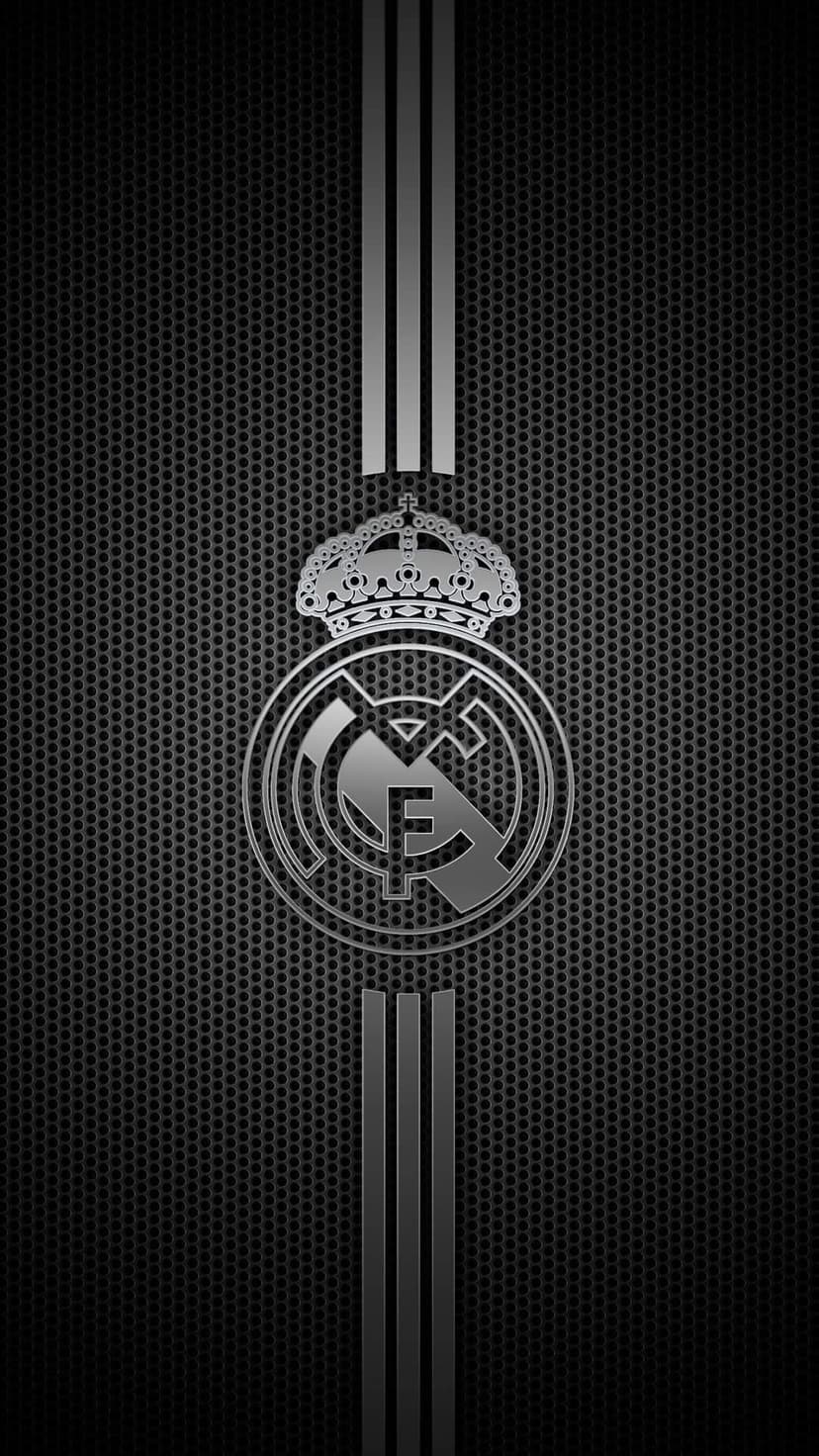 Real Madrid metallic silver crest centered on a dark gray perforated metal background with three vertical stripes.