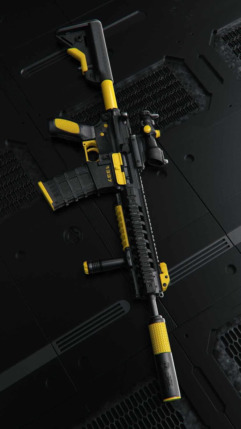 Modern assault rifle with yellow accents and a matte black finish lies on a dark hexagonal textured tactical mat.