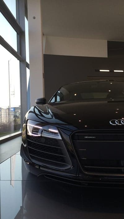Sleek Black Audi R8 in Modern Showroom