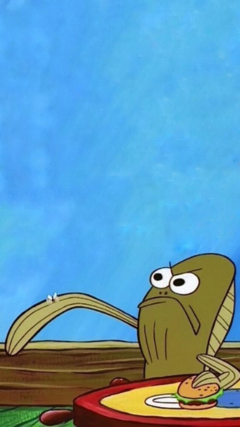 Green fish character with a skeptical expression staring at a small burger against a bright blue background.