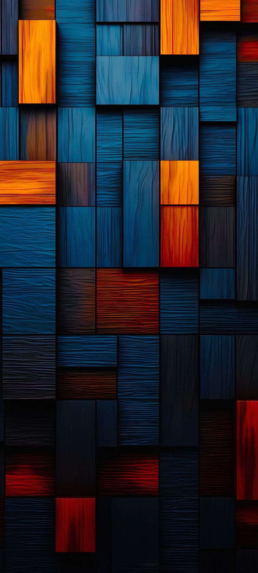 Interlocking wood cubes with visible grain patterns display a mix of vibrant orange, deep blue, and red hues.