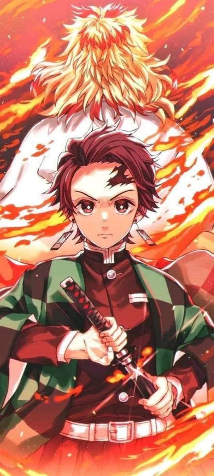 Tanjiro Kamado holds his sword as Kyojuro Rengoku looms behind him amidst swirling embers and orange flames.