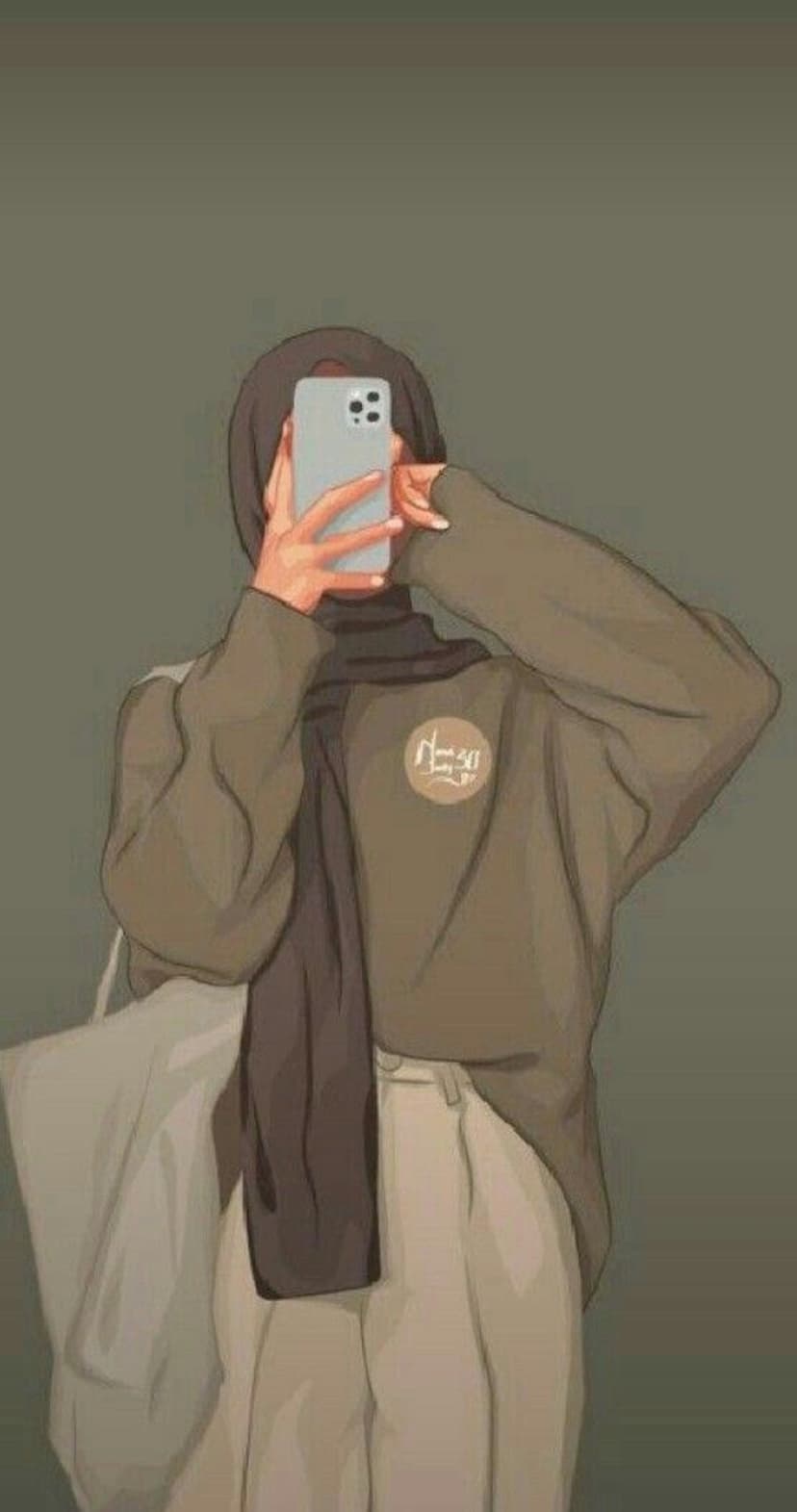 Woman in a hijab and brown sweater taking a smartphone selfie while carrying a large white canvas tote bag.