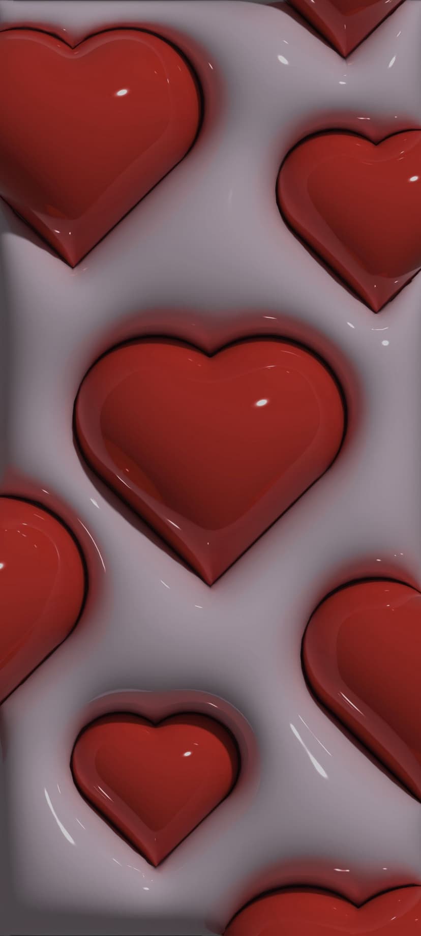 Red glossy hearts partially buried in a smooth white undulating surface with realistic depth and shadows.