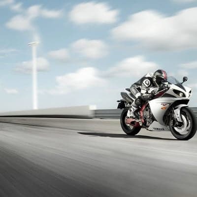 High-Speed Yamaha Sportbike Track Lean Wallpaper
