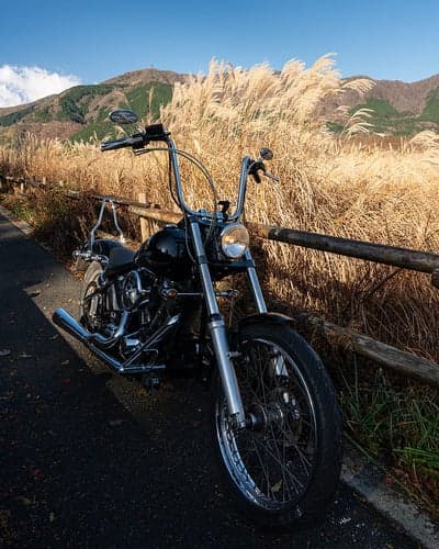 Black Cruiser Motorcycle Autumn Mountain Phone Background