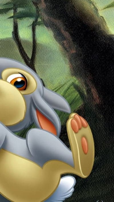 Thumper the rabbit peeking out from behind a tree