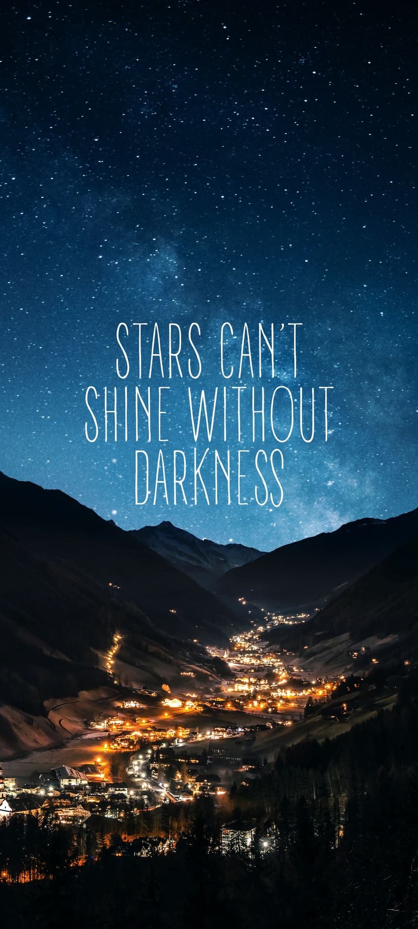 Small mountain village lights under a starry night sky with a quote about stars shining in the darkness.