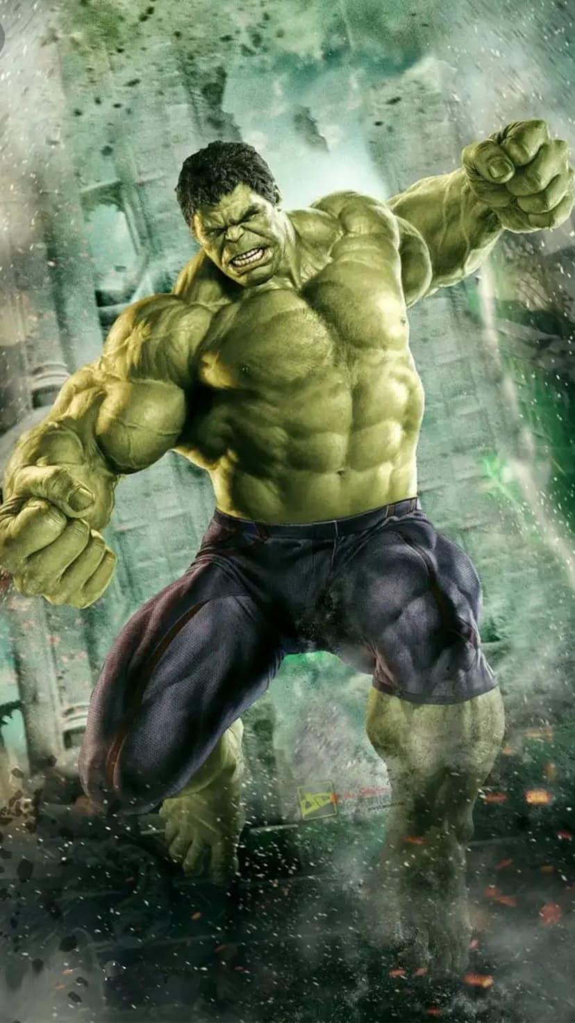 Enraged Hulk bellows with clenched fists while standing amidst flying concrete debris and glowing green energy.