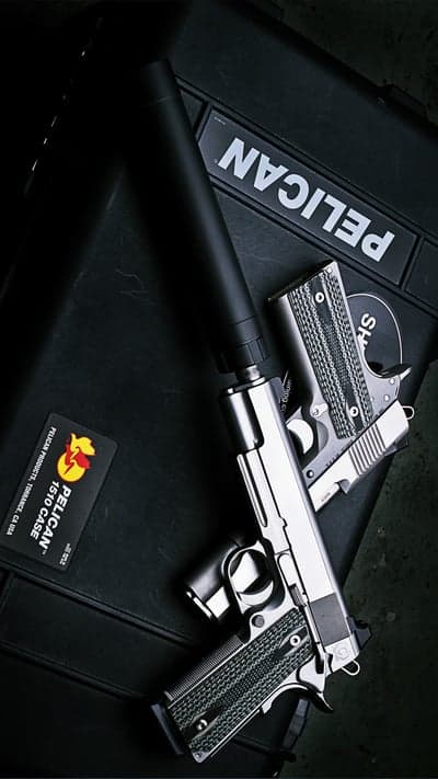 Silver Pistols with Suppressor on Black Pelican Case