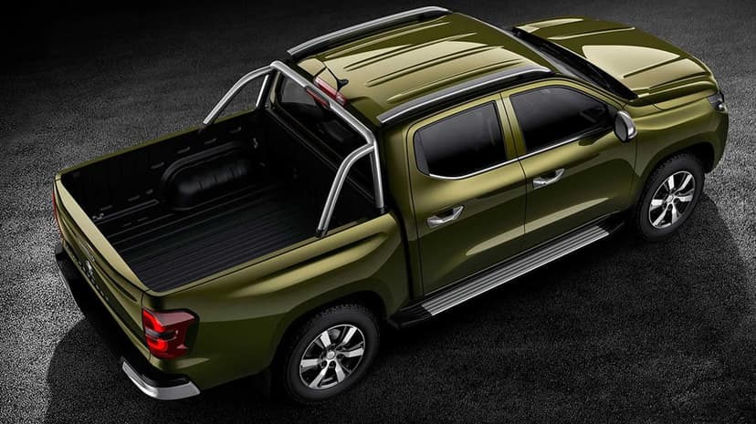 Olive green pickup truck viewed from above on dark asphalt with chrome accents and a silver roll bar.