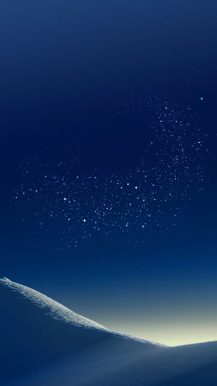 Snow-dusted sand dunes sit under a vibrant night sky filled with stars, distant galaxies, and deep blue nebulae.
