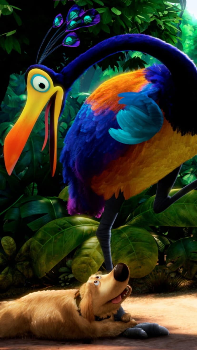Kevin the exotic bird with blue feathers stands near Dug the golden retriever on a green tropical forest floor.