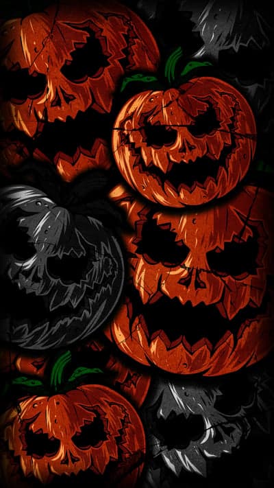 Menacing Jack-O-Lantern Pile Creepy Halloween Wallpaper