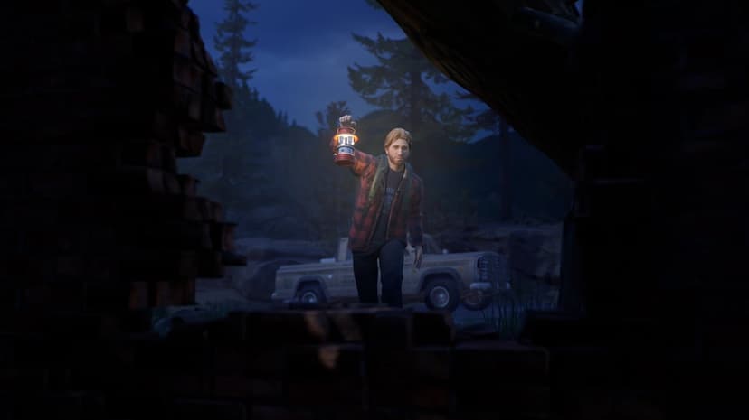 Man in red flannel holding a glowing lantern at night by a truck, framed through a broken brick wall.