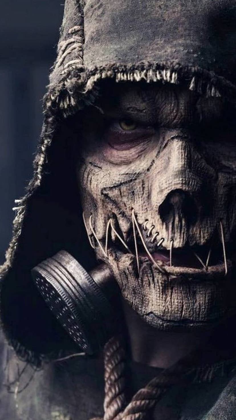 Scarecrow mask featuring burlap texture, a black gas mask, stitched lips, and thick rope around the neck area.