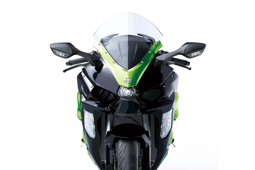 Front view of a black and lime green Kawasaki Ninja H2 SX motorcycle with a clear windshield on white background.