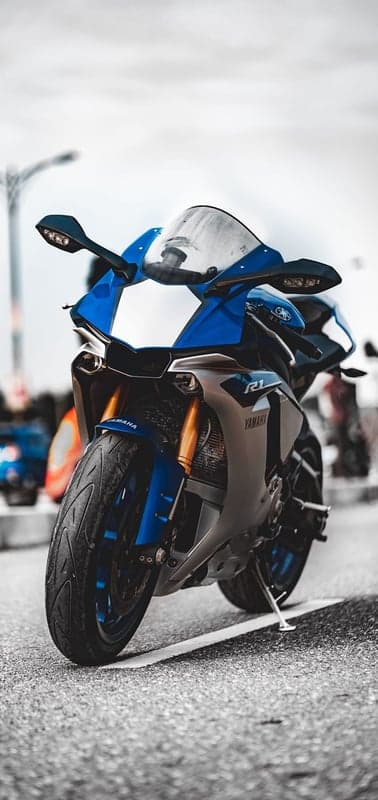 Blue Yamaha R1 Motorcycle Parked on Asphalt Road