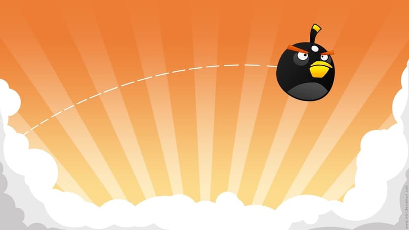 Bomb from Angry Birds flying in an arc over white clouds against a bright orange sunburst background.