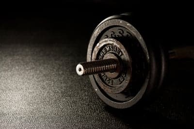 Close-up of a weight plate on a dumbbell