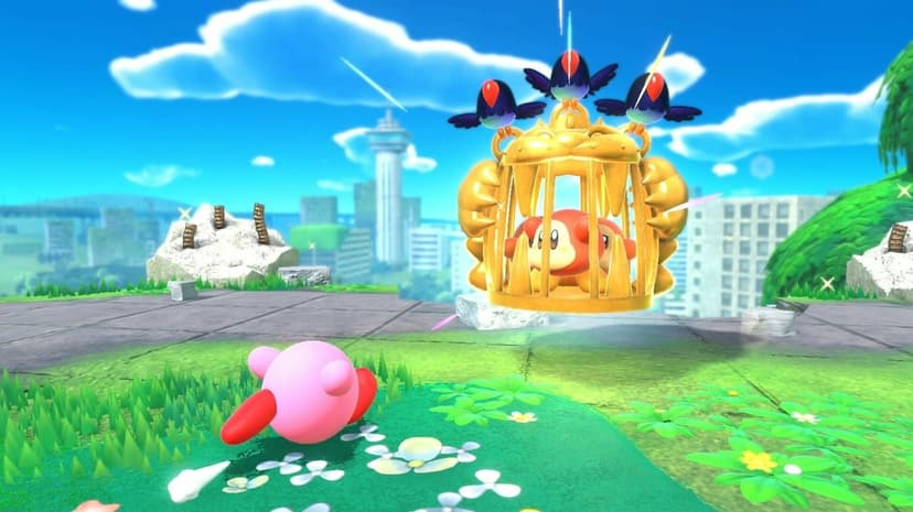 Kirby stands on grass facing Waddle Dees trapped in a golden cage against a city skyline and blue sky.