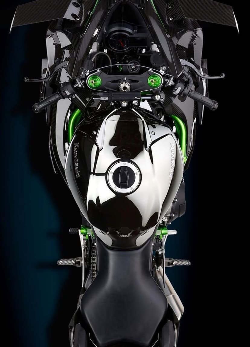 Kawasaki Ninja H2R seen from above, showing carbon fiber fairings, a chrome fuel tank, and green accents.