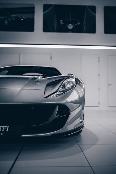 Sleek Silver Ferrari Front End in Modern Showroom