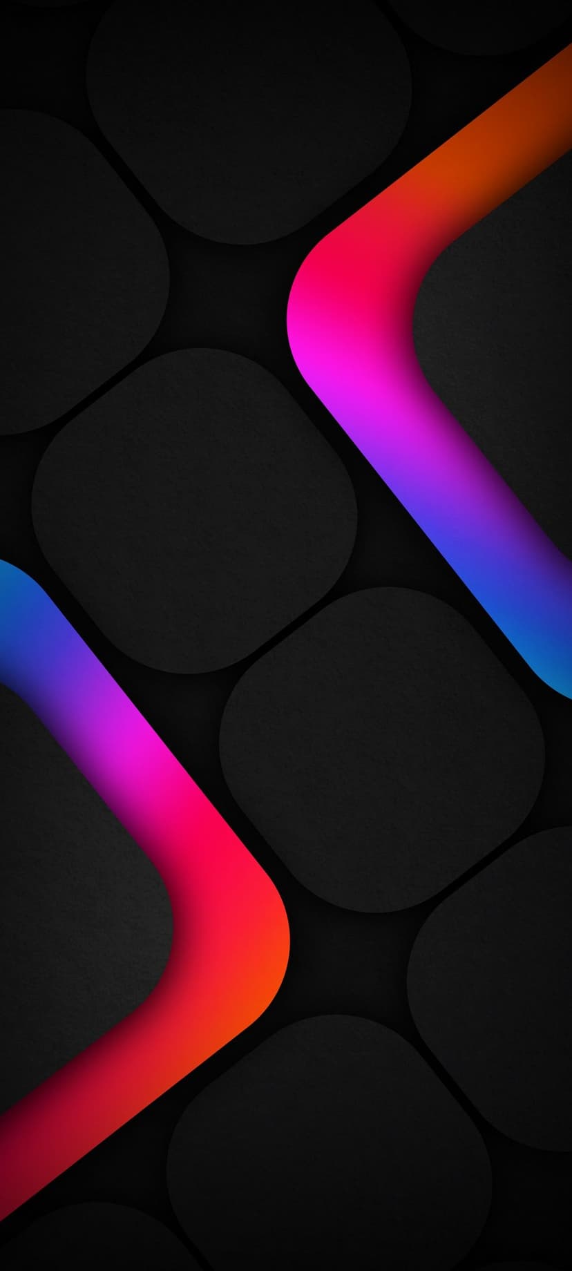 Glowing red and blue ribbons curve over a dark grey textured surface with rounded pebble-like shapes and soft shadows.