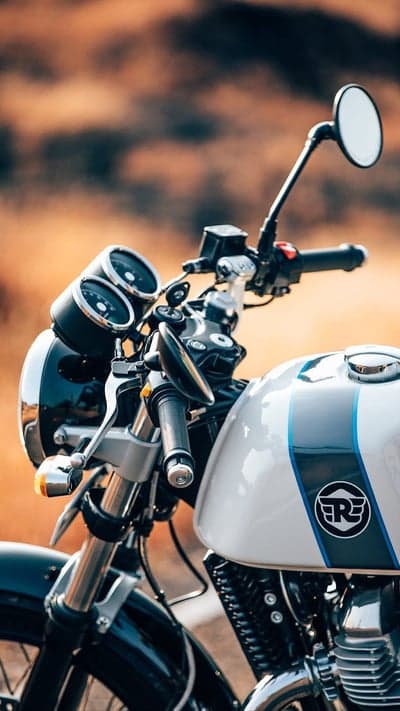 Classic Royal Enfield Fuel Tank Autumn Sunlight Background