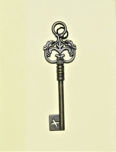 Antique Ornate Key with Dragon Heads and Cross Detail