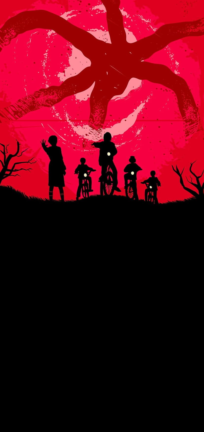 Kids on bicycles pedal through a dark landscape beneath a red sky featuring giant monster tendrils.