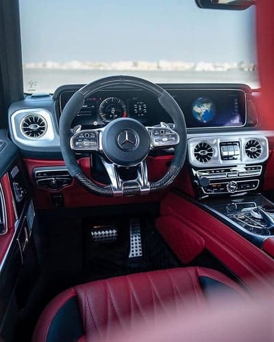 Luxurious Red Mercedes G-Wagon Interior with Modern Dashboard