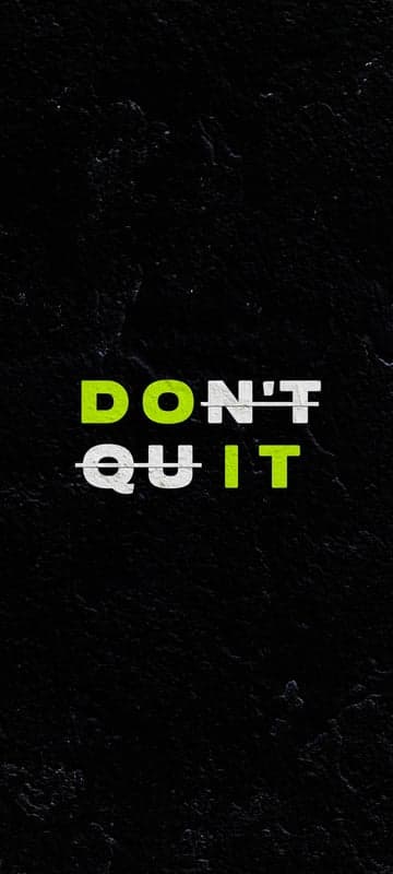 Motivational "Don't Quit" Text on Textured Black Background