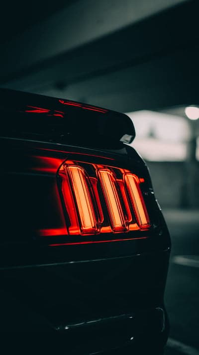 Mustang Rear LED Lights Mobile Wallpaper Dark Garage