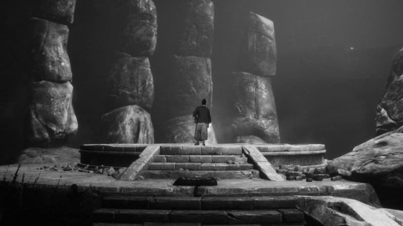 Samurai silhouette on a stone platform facing four massive finger-like stone pillars in a misty monochrome scene.