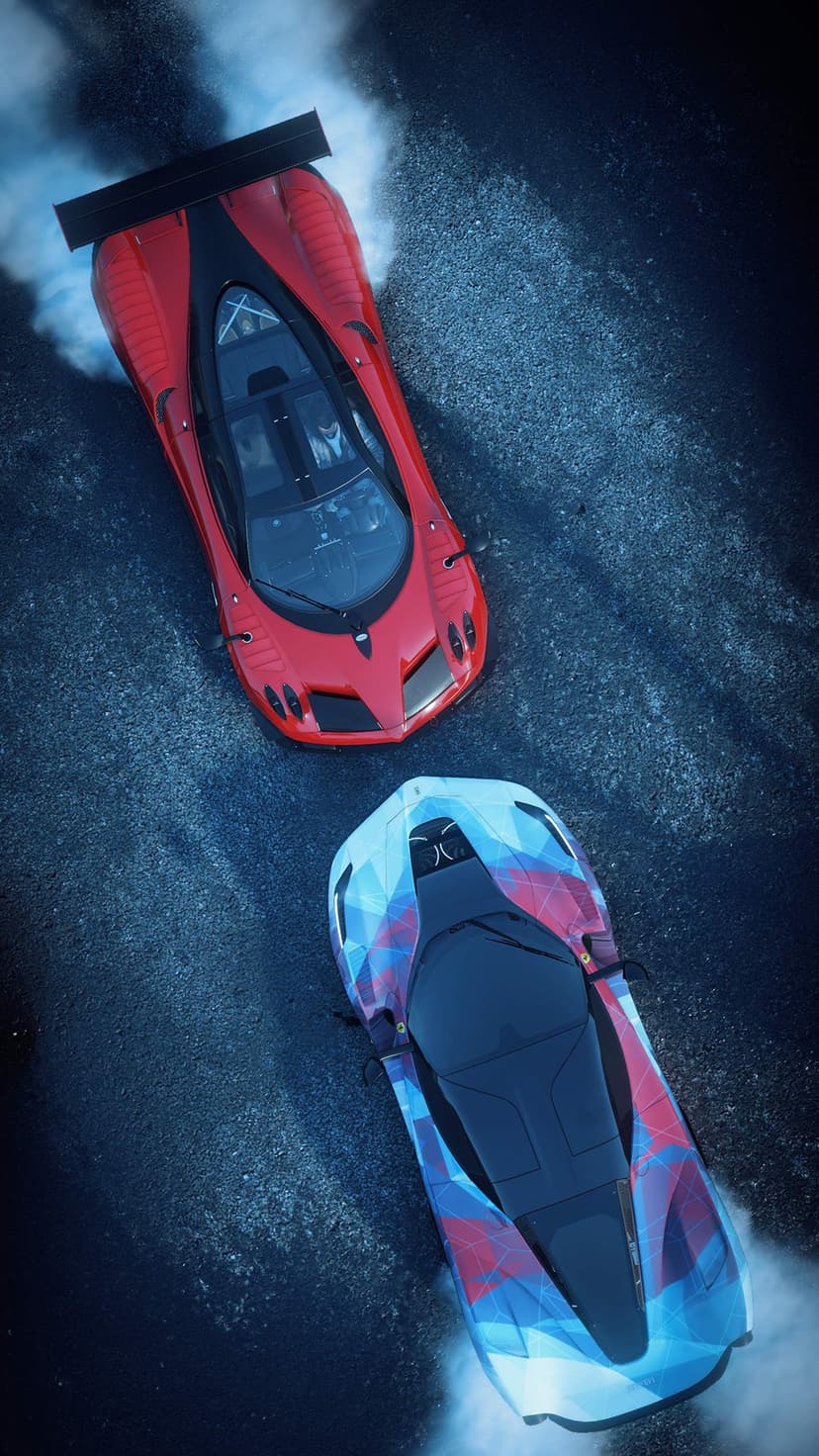Twin race cars drifting side-by-side on dark asphalt with white smoke plumes captured from an overhead angle.