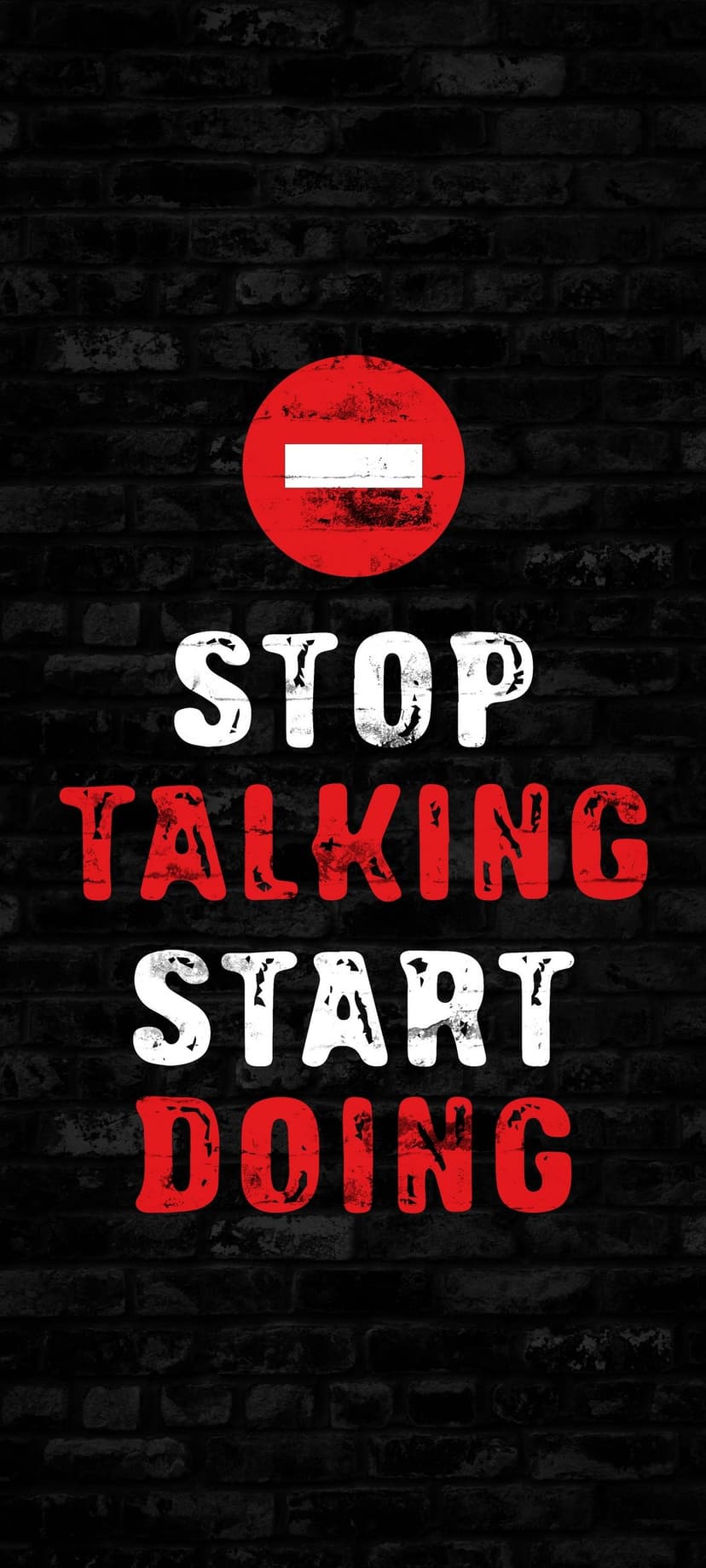 Red stop sign above white and red text reading Stop Talking Start Doing against a dark weathered brick background.