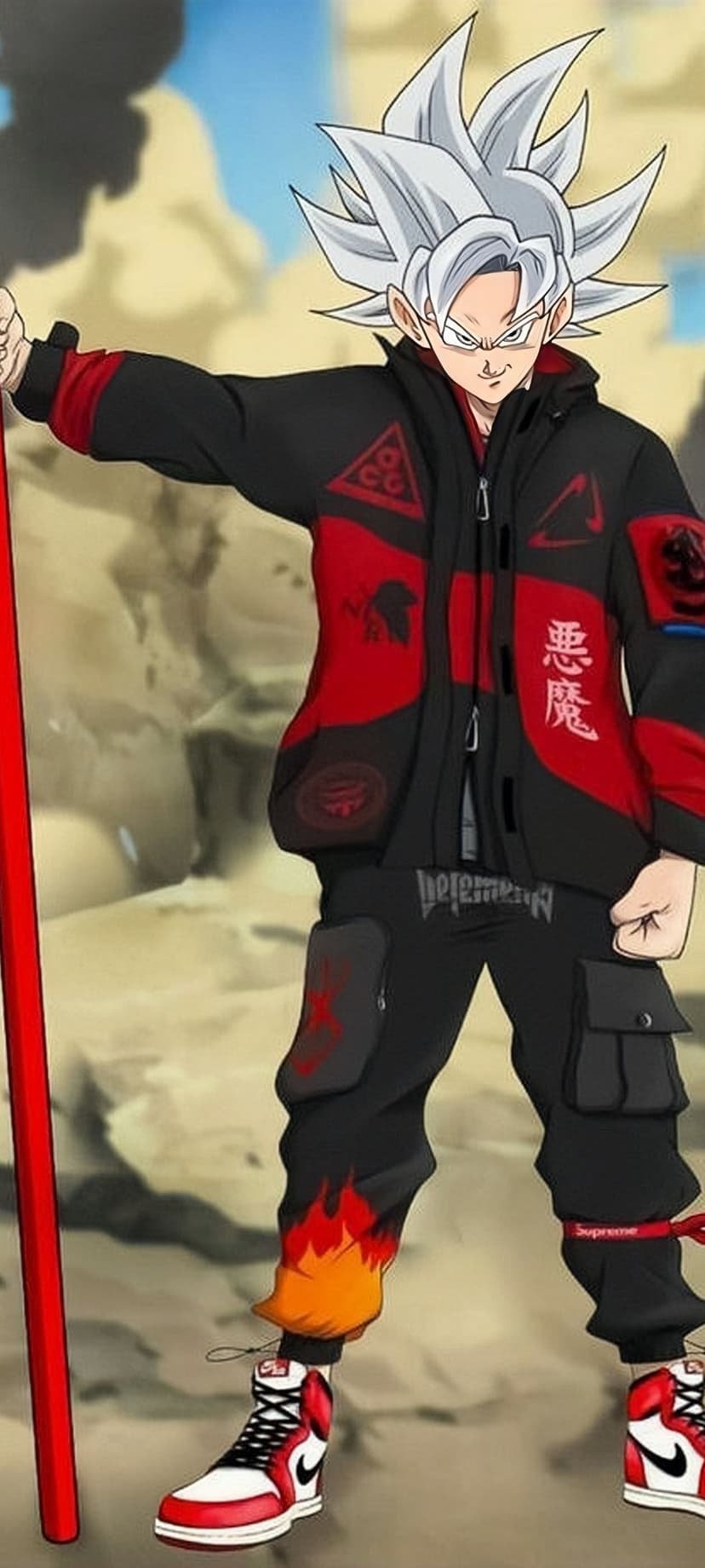 Goku in a black and red streetwear jacket and cargo pants holds a red staff against a rocky desert background.
