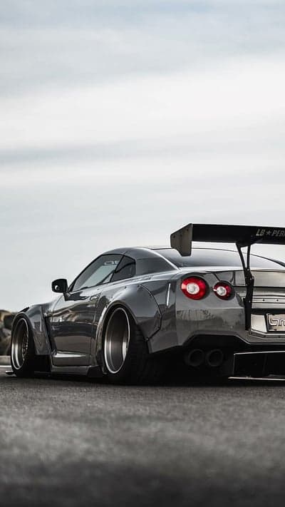 Aggressive Nissan GTR Widebody Custom with Large Spoiler