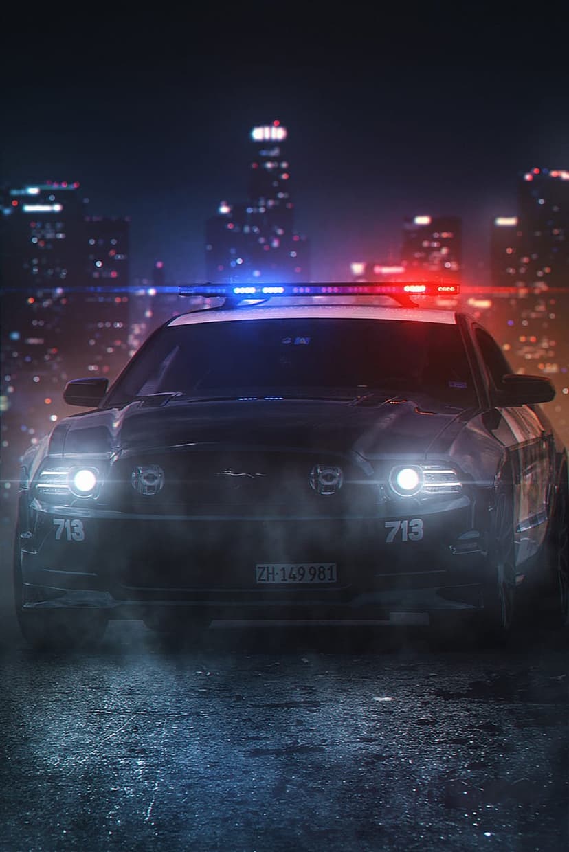 Police car with flashing red and blue lights sits on a wet city street amidst swirling smoke and neon reflections.
