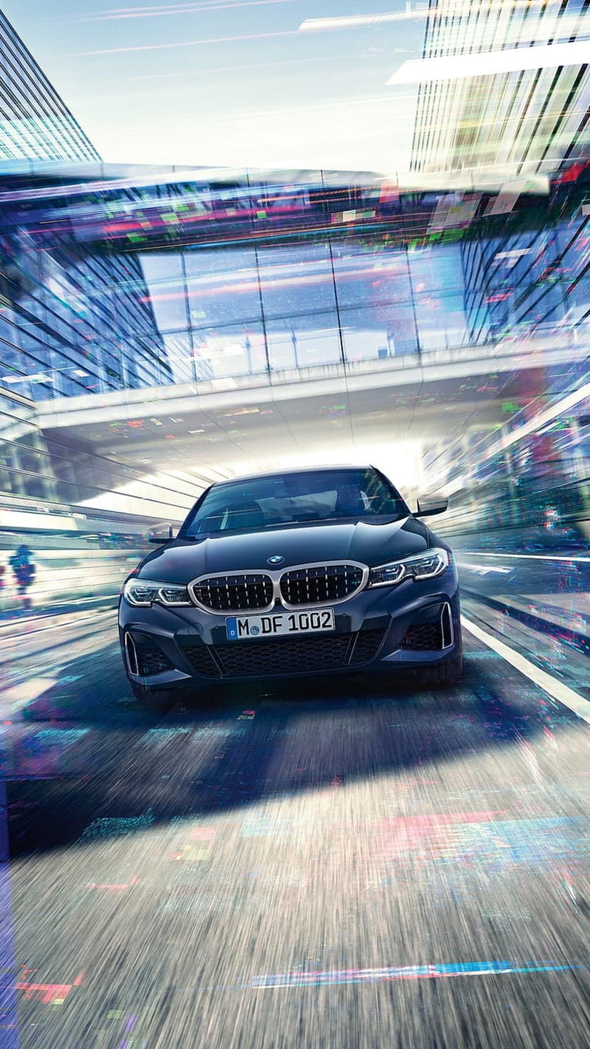 Black BMW sports car speeding through a futuristic night city with blue light trails and modern skyscrapers.