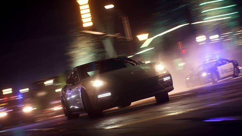 Porsche racing through a night city street with police cars and flashing lights in heavy motion blur.