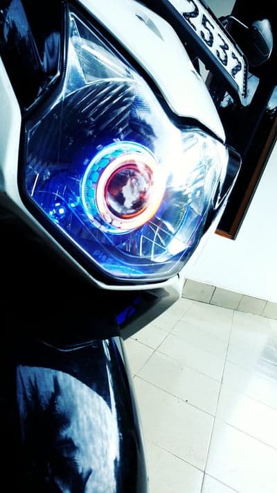 Motorcycle Headlight with Blue LED Ring and License Plate