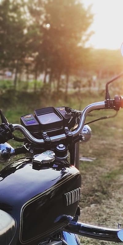 Golden Hour Yamaha Bike Close-up Phone Background