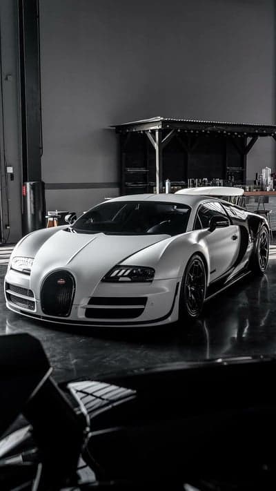 White Bugatti Veyron in a Garage with Reflections
