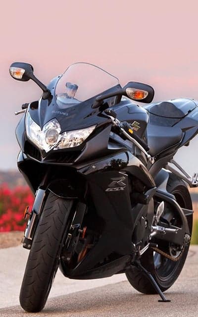 Sleek Black Suzuki GSX Motorcycle at Sunset