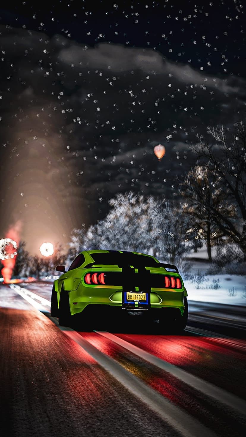 Neon green Mustang car drifting on a snowy mountain road at night under a starry sky with hot air balloons.