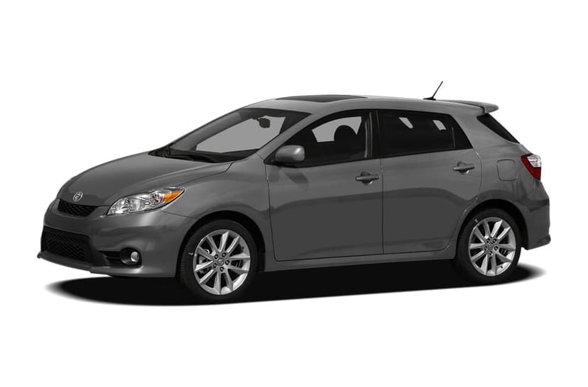 Metallic gray Toyota Matrix hatchback at a three-quarter angle on a white background with sharp studio lighting.