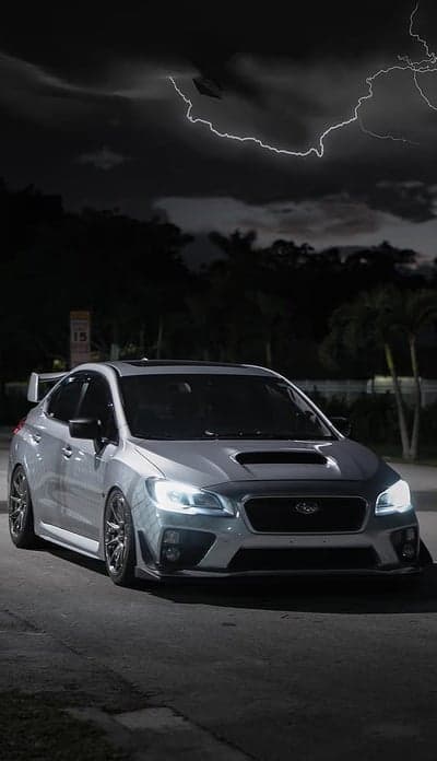 Silver Subaru WRX STI Stormy Night Mobile Wallpaper