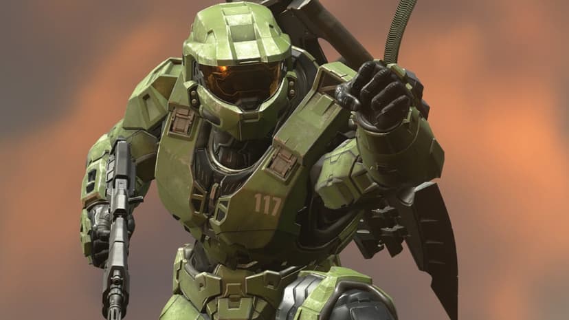 Master Chief in green MJOLNIR armor reaches forward while holding a rifle against a blurred orange background.